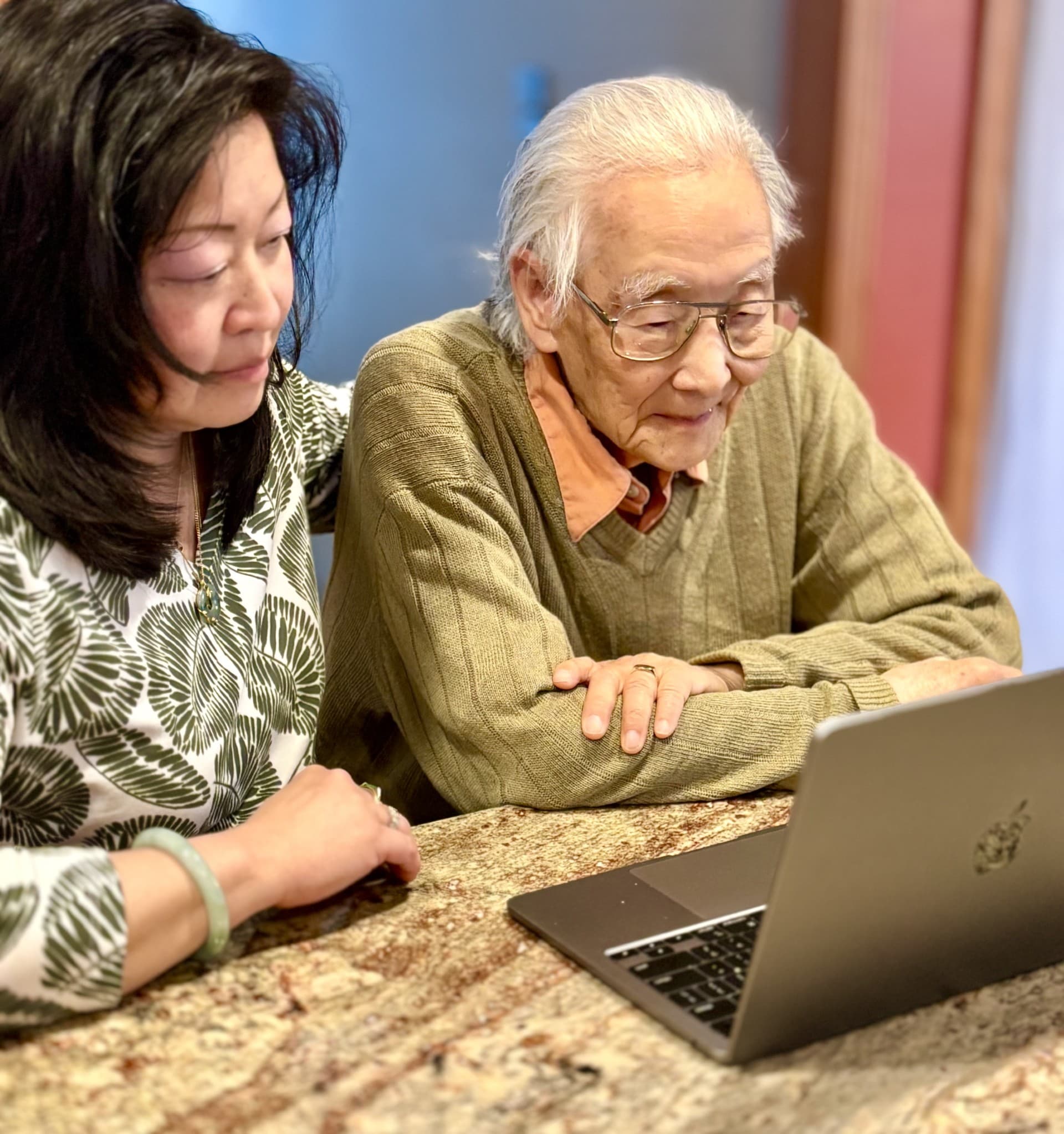 Father and daughter reviewing brain health test results together
